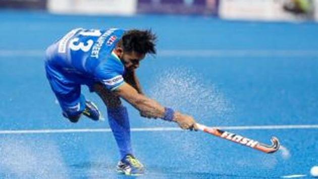 Harmanpreet Singh takes a shot against Australia.(Hockey India)