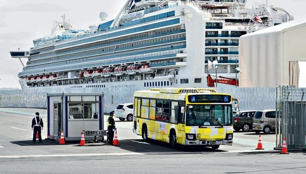 With the disembarkation, a 14-day quarantine is expected to start for more than 1,000 crew still on board as many of them did not undergo quarantine because they were needed to keep the ship running.(AP Photo/Eugene Hoshiko)