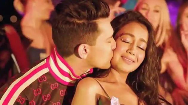 Neha Kakkar and Aditya Narayan in a still from a music video.