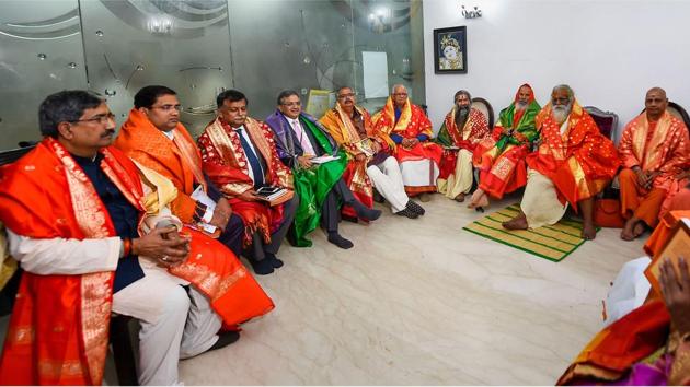Members of the Sri Ram Janmabhoomi Teerth Kshetra, the trust setup to oversee construction of the Ram Temple at Ayodhya, during its first meeting at Greater Kailash - I in New Delhi. Ram Janam Bhoomi Nyas chief Mahant Nritya Gopal Das (2nd from R) is also seen. (Kamal Singh / PTI)