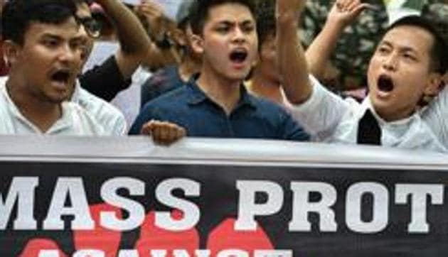 Manipur University Student's Union (MUSU) raise slogans demanding the removal of Vice Chancellor Adya Prasad Pandey, in New Delhi(PTI)