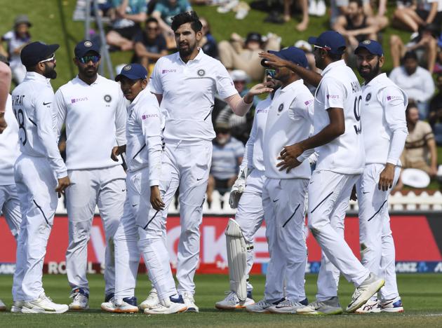 India's Ishant Sharma, center, celebrates the dismissal of New Zealand's Tom Blundell for 30 during the first cricket test between India and New Zealand at the Basin Reserve in Wellington. (AP)