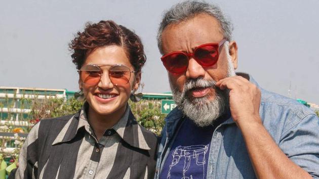 Taapsee Pannu with film director Anubhav Sinha poses for photographs during a promotional event of their upcoming movie Thappad.(PTI)