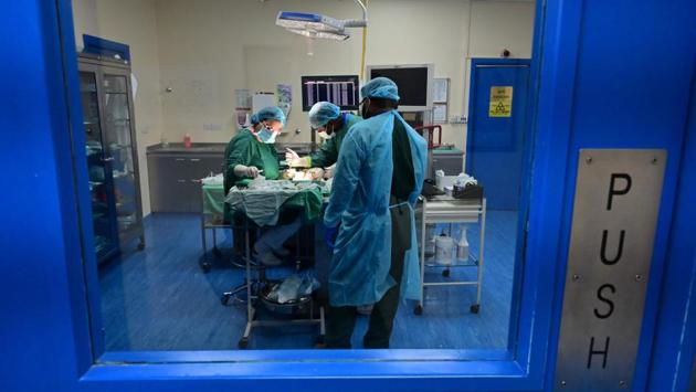 Margit Gabriele Muller (L) preforms minor surgery on a falcon. Animals other than guide dogs are not usually allowed in the cabins of the UAE’s main carriers, but for falcons exceptions are made. Abu Dhabi’s Etihad permits falcons in the cabin or as checked baggage, and Dubai’s Emirates allows birds to travel alongside their owner to certain destinations in Pakistan. (Guiseppe Cacace / AFP) Margit Gabriele Muller (L) preforms minor surgery on a falcon. Animals other than guide dogs are not usually allowed in the cabins of the UAE’s main carriers, but for falcons exceptions are made. Abu Dhabi’s Etihad permits falcons in the cabin or as checked baggage, and Dubai’s Emirates allows birds to travel alongside their owner to certain destinations in Pakistan. (Guiseppe Cacace / AFP)