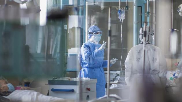 Nurses work at an ICU ward specialised for patients infected by coronavirus in Wuhan in central China's Hubei Province. (AP Photo) Nurses work at an ICU ward specialised for patients infected by coronavirus in Wuhan in central China's Hubei Province. (AP Photo)