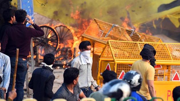 As CAA protests turned violent vehicles and houses set on fire by mob in northeast Delhi’s Maujpur. (Raj K Raj/HT Photo) As CAA protests turned violent vehicles and houses set on fire by mob in northeast Delhi’s Maujpur. (Raj K Raj/HT Photo)
