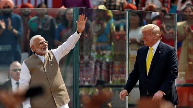 Prime Minister Narendra Modi with US President Donald Trump as they attend the "Namaste Trump" event at Sardar Patel Gujarat Stadium, in Ahmedabad, February 24, 2020.(REUTERS)