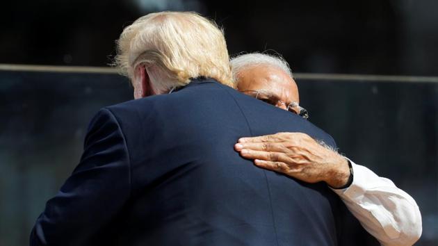 U.S. President Donald Trump and Indian Prime Minister Narendra Modi embrace during the ‘Namaste Trump’ event during Trump's visit to India. (REUTERS)