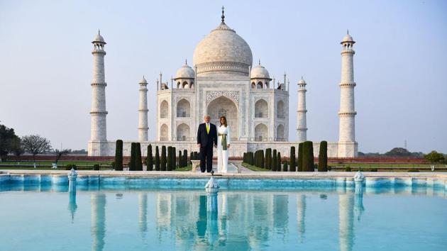 US President Donald Trump and first Lady Melania Trump pose as they visit the Taj Mahal in Agra. Uttar Pradesh governor Anandiben Patel and CM Yogi Adityanath welcomed President Donald Trump and first lady Melania Trump at the airport. (Mandel NGAN / AFP)