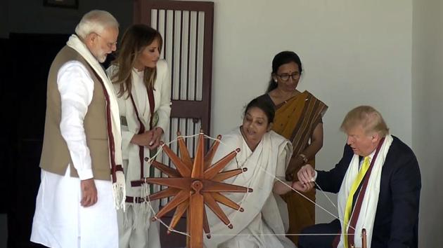US President Donald Trump and First Lady Melania Trump with Prime Minister Narendra Modi spin the Charkha at Sabarmati Ashram in Ahmedabad. (ANI)