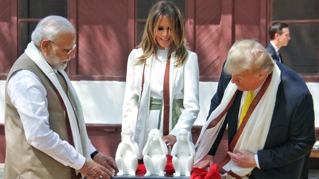US President Donald Trump with first Lady Melania Trump and Prime Minister Narendra Modi, at Sabarmati Ashram in Ahmedabad on Monday. Amid tight security, Donald Trump and Narendra Modi held a 22km roadshow in Ahmedabad. After a brief stopover at Sabarmati Ashram, the Trumps and the Prime Minister headed to the Motera stadium. (ANI)