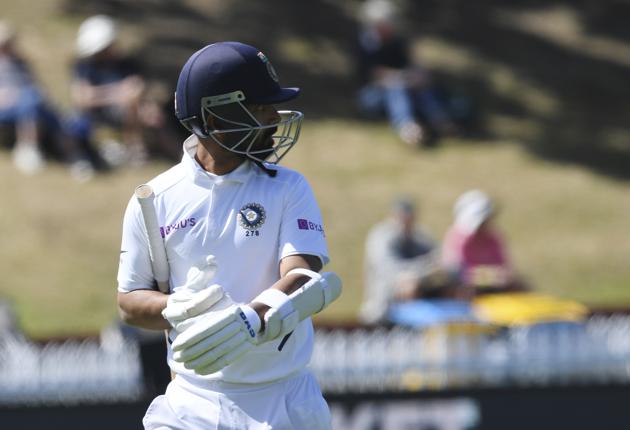 India's Ajinkya Rahane looks back as he leaves the field after being dismissed by New Zealand's Trent Boult for 29 runs during the first cricket test between India and New Zealand at the Basin Reserve in Wellington, New Zealand, Monday, Feb. 24, 2020. (AP Photo/Ross Setford) (AP)