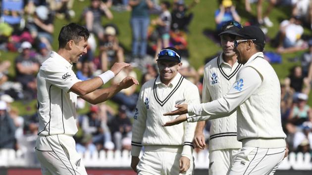 New Zealand's Trent Boult, left, celebrates with teammate Ross Taylor.(AP)