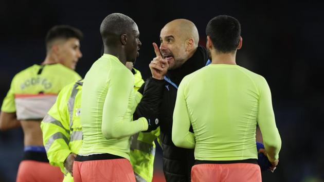 Manchester City manager Pep Guardiola speaks with his players after the match.(REUTERS) Manchester City manager Pep Guardiola speaks with his players after the match.(REUTERS)