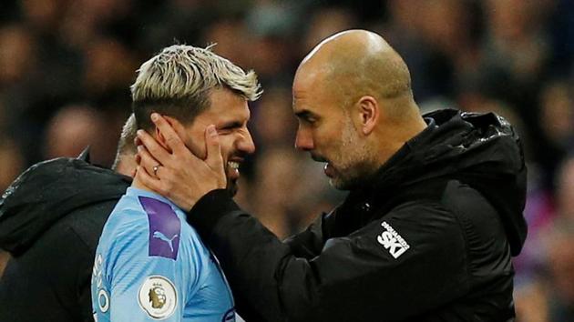 Manchester City manager Pep Guardiola with Sergio Aguero. (REUTERS) Manchester City manager Pep Guardiola with Sergio Aguero. (REUTERS)