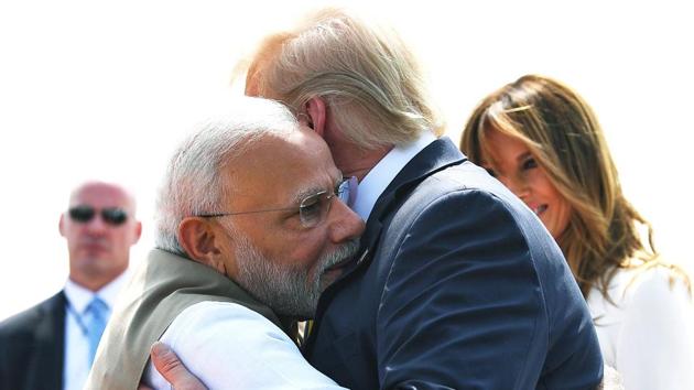 Prime Minister Narendra Modi hugs US President Donald Trump as First Lady Melania Trump looks on. (ANI)
