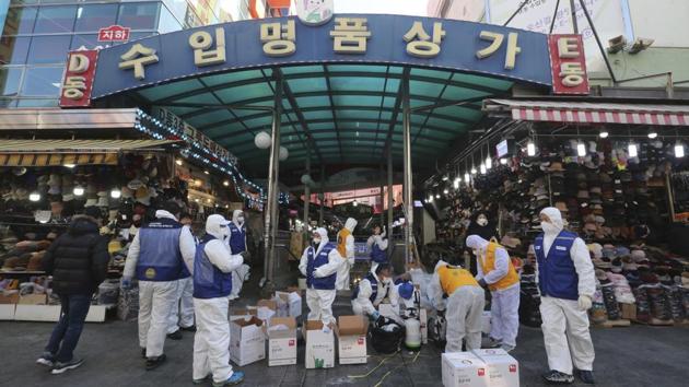 The number of cases in South Korea has soared past 800 in the past few days -- the highest figure outside China -- leaving eight dead. (AP)