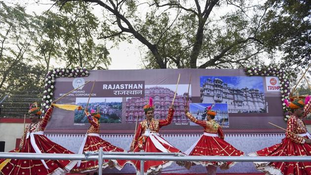 Folk dancers rehearse their performance along a route U.S. President Donald Trump and first lady Melania Trump are expected to take during their visit in Ahmedabad. (PTI)