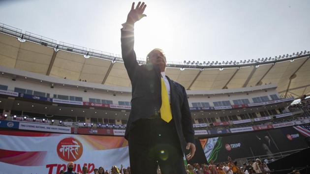 US President Donald Trump waves as he departs after the "Namaste Trump" event at Sardar Patel Stadium in Ahmedabad on Monday.(AP Photo)