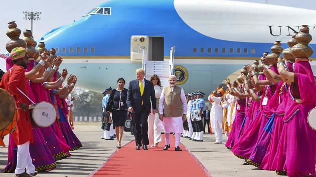 Prime Minister Narendra Modi welcomes US President Donald Trump and first Lady Melania Trump, on their arrival at the Sardar Vallabhbhai Patel International Airport in Ahmedabad. Trump began his two-day India visit on Monday. He arrived in Ahmedabad around 11.40am for the first-leg of his trip. (PTI)