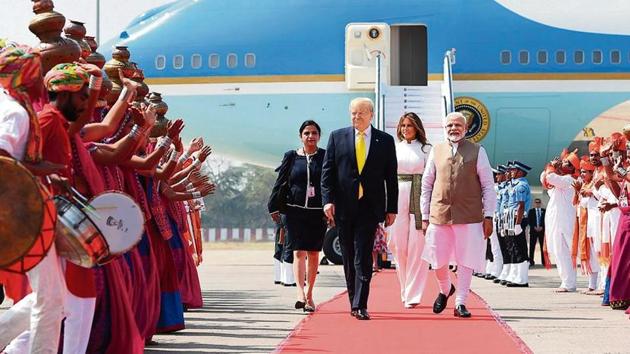 Prime Minister Narendra Modi welcomes US President Donald Trump and First Lady Melania Trump at Sardar Vallabhbhai Patel International Airport on Monday.(Photo: AFP)