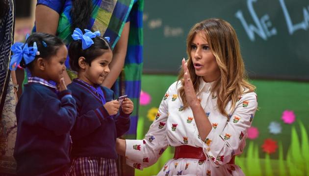 US First Lady Melania Trump interacts with school children during her visit to a government school to witness various activities as part of the 'happiness curriculum', in New Delhi. (PTI) US First Lady Melania Trump interacts with school children during her visit to a government school to witness various activities as part of the 'happiness curriculum', in New Delhi. (PTI)