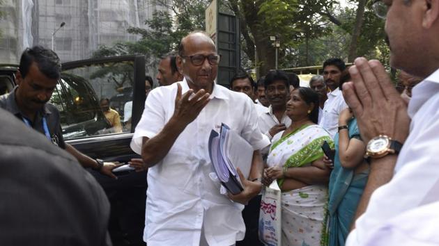 NCP Chief Sharad Pawar along with Jitendra Awhad , minister of housing arrives for NCP party minister's meeting.(Anshuman Poyrekar/HT Photo) NCP Chief Sharad Pawar along with Jitendra Awhad , minister of housing arrives for NCP party minister's meeting.(Anshuman Poyrekar/HT Photo)