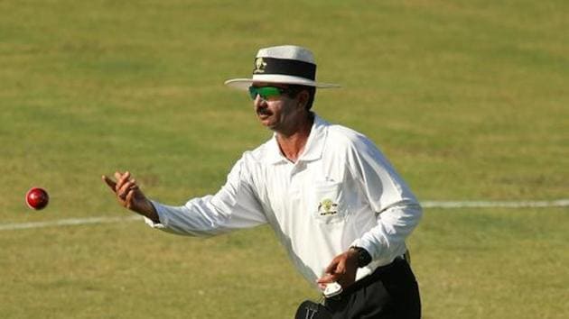 Umpire Anil Chaudhary hands the new ball.(Getty Images)