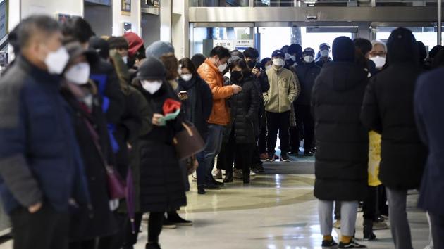 People line up to buy face masks at a store in Daegu, South Korea, Monday, Feb. 24, 2020. South Korea's President Moon Jae-in on Sunday put the country on its highest alert for infectious diseases and says officials should take "unprecedented, powerful" steps to fight a viral outbreak.(AP) People line up to buy face masks at a store in Daegu, South Korea, Monday, Feb. 24, 2020. South Korea's President Moon Jae-in on Sunday put the country on its highest alert for infectious diseases and says officials should take "unprecedented, powerful" steps to fight a viral outbreak.(AP)