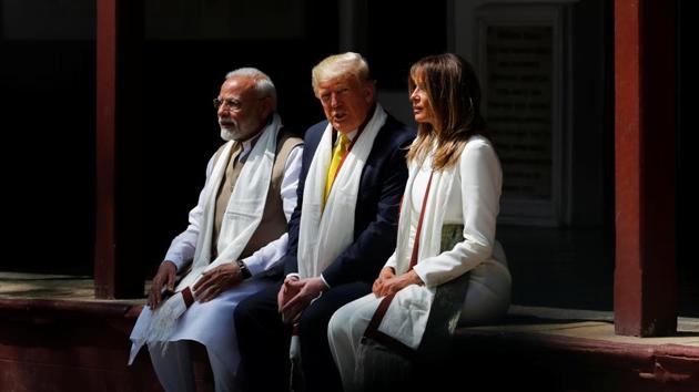 Indian Prime Minister Narendra Modi, US President Donald Trump and First Lady Melania Trump visit the Gandhi Ashram in Ahmedabad.(REUTERS)