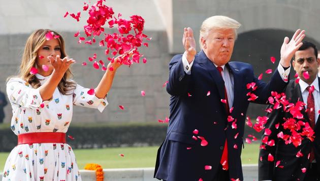 US President Donald Trump and first lady Melania Trump spray flower petals during wreath laying ceremony at Mahatma Gandhi's memorial at Raj Ghat in New Delhi, India, February 25, 2020 (Reuters photo) US President Donald Trump and first lady Melania Trump spray flower petals during wreath laying ceremony at Mahatma Gandhi's memorial at Raj Ghat in New Delhi, India, February 25, 2020 (Reuters photo)