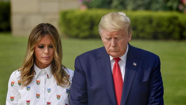 United States President Donald Trump (Right) and First Lady Melania Trump (Left) paid homage to Mahatma Gandhi at Rajghat in New Delhi.(PTI)