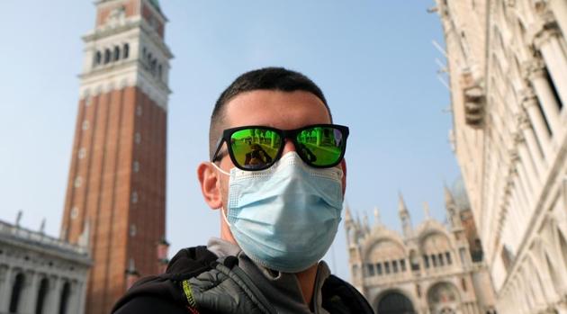 A man wears a protective face mask in St. Mark's Square. (Representational)(REUTERS)