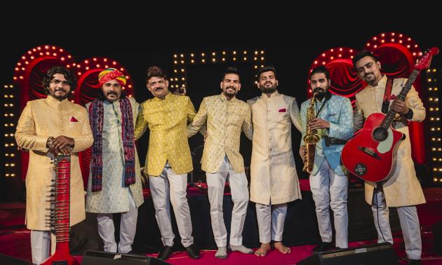 (From left to right) Arif Khan (zitar player), Arif Khan (khartal and morchang player), Sajid Khan (drummer), Saif Ali Khan (tabla player), Asif Khan (lead singer), Tasruf Ali (saxophone) and Rishab Rozar (guitar)