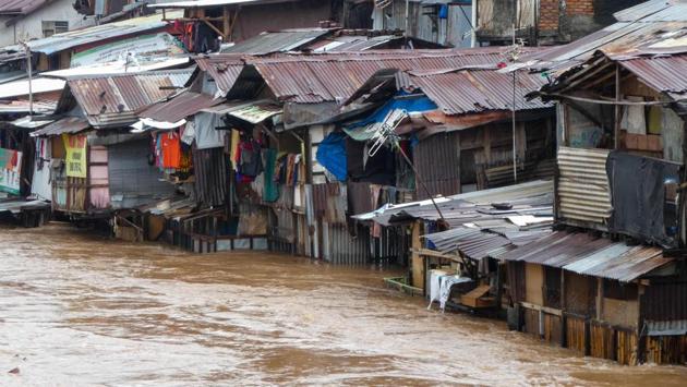 Flooded residential houses are seen after heavy rain in Jakarta. A spokesman for the Disaster Mitigation Agency said it was too early to assess the number of displaced or the scale of the damage in Tuesday’s floods. The army and police would help to rescue people, said the spokesman, Agus Wibowo. (BAY ISMOYO / AFP)