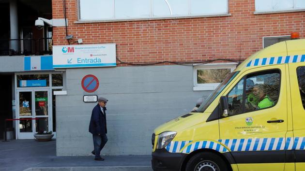 A man walks past an ambulance as he leaves Hospital Carlos III, where a case of novel coronavirus has been confirmed, in Madrid, Spain February 26, 2020. (REUTERS) A man walks past an ambulance as he leaves Hospital Carlos III, where a case of novel coronavirus has been confirmed, in Madrid, Spain February 26, 2020. (REUTERS)