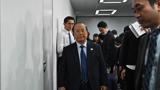 Chief executive officer of the Tokyo 2020 Olympics, Toshiro Muto (C) leaves after a media briefing in Tokyo on February 26, 2020. (Photo by Philip FONG / AFP)(AFP) Chief executive officer of the Tokyo 2020 Olympics, Toshiro Muto (C) leaves after a media briefing in Tokyo on February 26, 2020. (Photo by Philip FONG / AFP)(AFP)