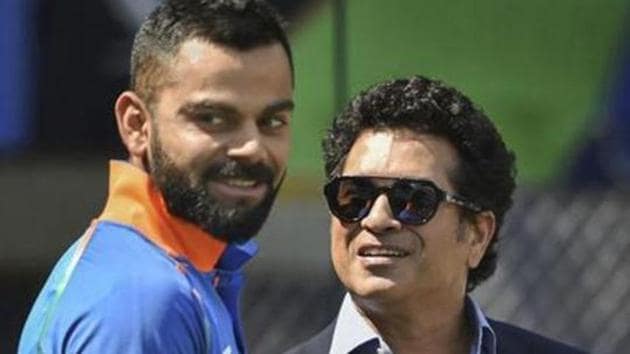 Mumbai: Indian batsman Virat Kohli and former cricketer Sachin Tendulkar (AP) Mumbai: Indian batsman Virat Kohli and former cricketer Sachin Tendulkar (AP)