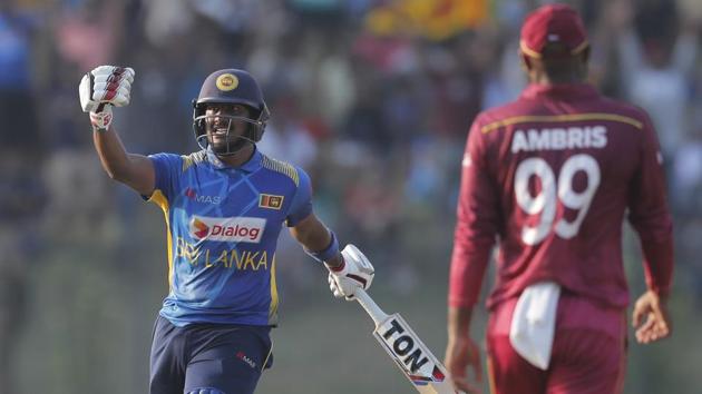 Sri Lanka's Avishka Fernando, left, celebrates his century during the second one day international cricket match between Sri Lanka and West Indies in Sooriyawewa, Sri Lanka, Wednesday, Feb. 26, 2020.(AP)