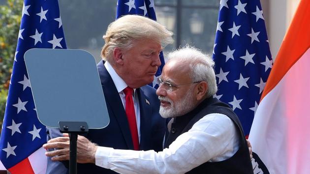 US President Donald Trump and Prime Minister Narendra Modi greet each other after their joint statement, at Hyderabad House, in New Delhi.(Mohd Zakir/HT PHOTO)