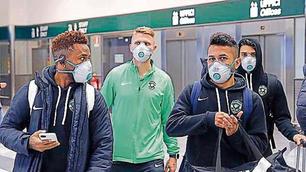 Bulgarian team Ludogorets players arrive at the Milan airport to play their Europa League in an empty stadium against Inter Milan(AP)