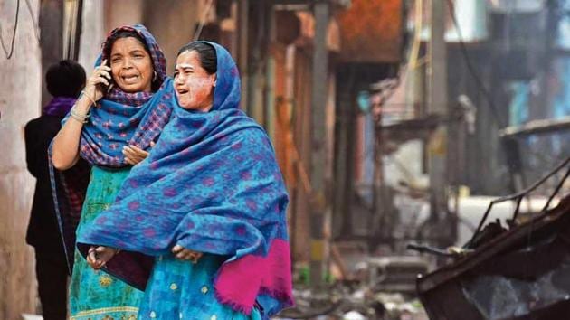 Women break down following violent clashes over the new citizenship law in New Delhi on Wednesday.(Photo: Raj K Raj/ Hindustan Times)