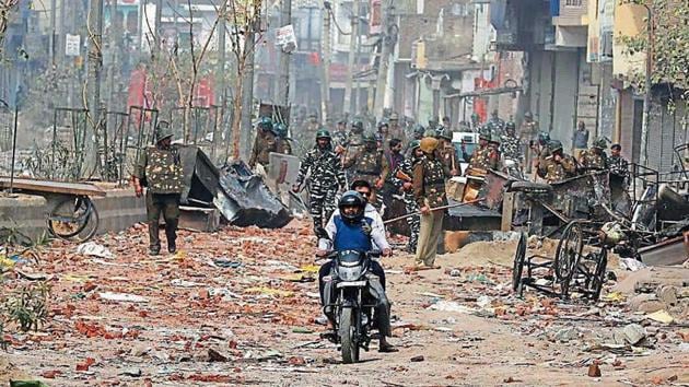 Several roads in Delhi are littered with bricks in the aftermath of the violence.(Reuters) Several roads in Delhi are littered with bricks in the aftermath of the violence.(Reuters)