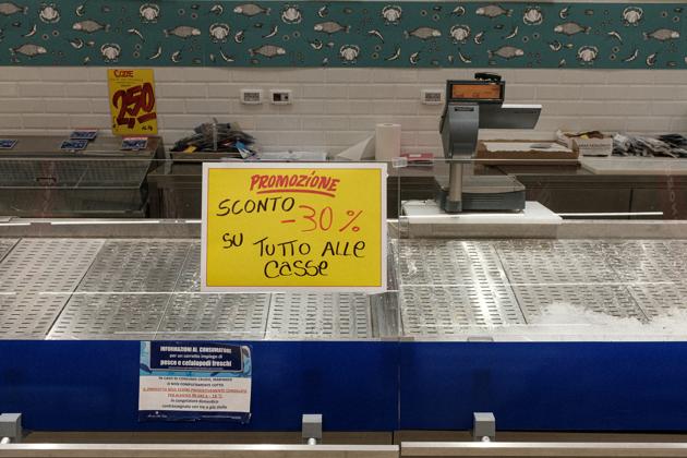 An empty fish stand is seen in a supermarket in Codogno, one of the towns on lockdown due to a coronavirus outbreak. (Marzio Toniolo / REUTERS)