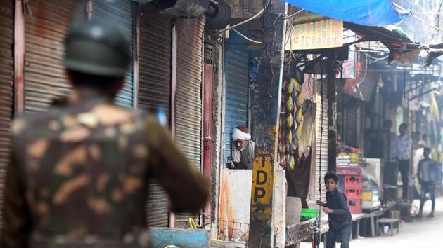 Police personnel patrol streets between Kadam Puri and Yamuna Vihar following violent clashes over the new citizenship law, in New Delhi.(Raj K Raj/HT PHOTO) Police personnel patrol streets between Kadam Puri and Yamuna Vihar following violent clashes over the new citizenship law, in New Delhi.(Raj K Raj/HT PHOTO)