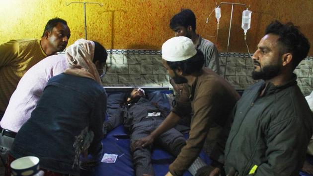 A man is treated following violent clashes in North East Delhi over the new citizenship law, at Al Hind Hospital.(Photo by Md Meharban / Hindustan Times) A man is treated following violent clashes in North East Delhi over the new citizenship law, at Al Hind Hospital.(Photo by Md Meharban / Hindustan Times)