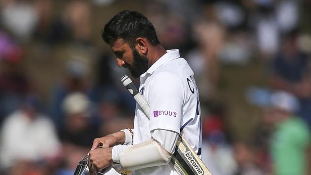 Cheteshwar Pujara of India leaves the field after being dismissed during day three of the First Test match between New Zealand and India(Getty Images)