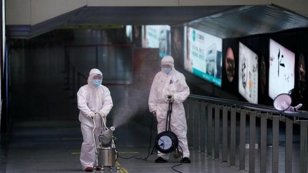 Workers with sanitizing equipment disinfect at the Shanghai railway station in Shanghai, China, as the country is hit by an outbreak of a new coronavirus. (REUTERS) Workers with sanitizing equipment disinfect at the Shanghai railway station in Shanghai, China, as the country is hit by an outbreak of a new coronavirus. (REUTERS)