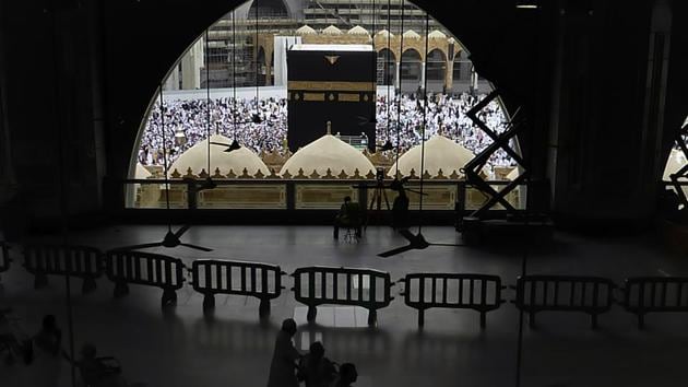 Pilgrims circumambulate around the Kaaba, the cubic building at the Grand Mosque, during the minor pilgrimage, known as Umrah in the holy city of Mecca, Saudi Arabia.(AP photo)