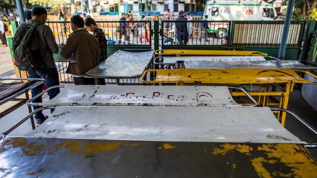 Stretchers seen outside the Guru Teg Bahadur Hospital. Delhi had already been a hot spot in deadly protests that swept across India after the parliament passed the Citizenship Amendment Act in December. (Prashanth Vishwanathan / Bloomberg)